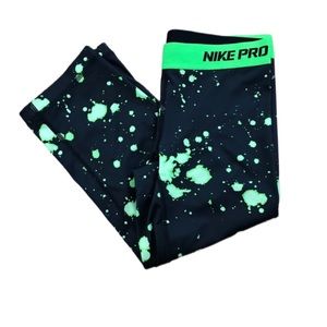 Nike Pro black leggings with green paint splatter